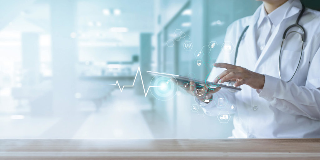 Doctor looking at medical device packaging solutions